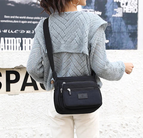 Compact Water-Resistant Nylon Bag with Zip Fastening
