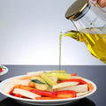 Glass Bottle with Handle and Lid