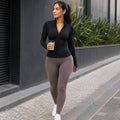 womens-sports-jacket-high-neck-with-zip-slim-fit-long-sleeve-for-training-and-winter-lifestyle-01